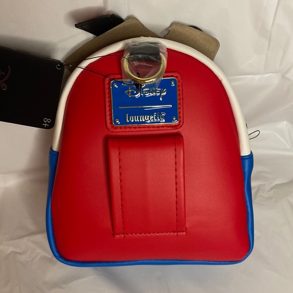 NWT Loungefly Disney Pinocchio Cosplay Wristlet (in original package) - Picture 4 of 9